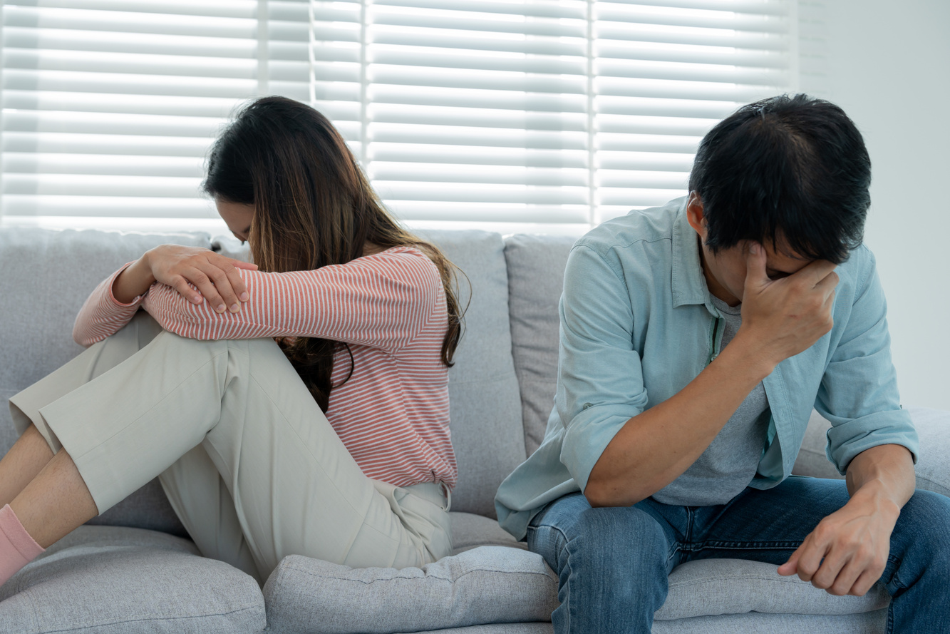 Divorce. Asian couples are desperate and disappointed after marriage. Husband and wife are sad, upset and frustrated after quarrels. distrust, love problems, betrayals. family problem, teenage love